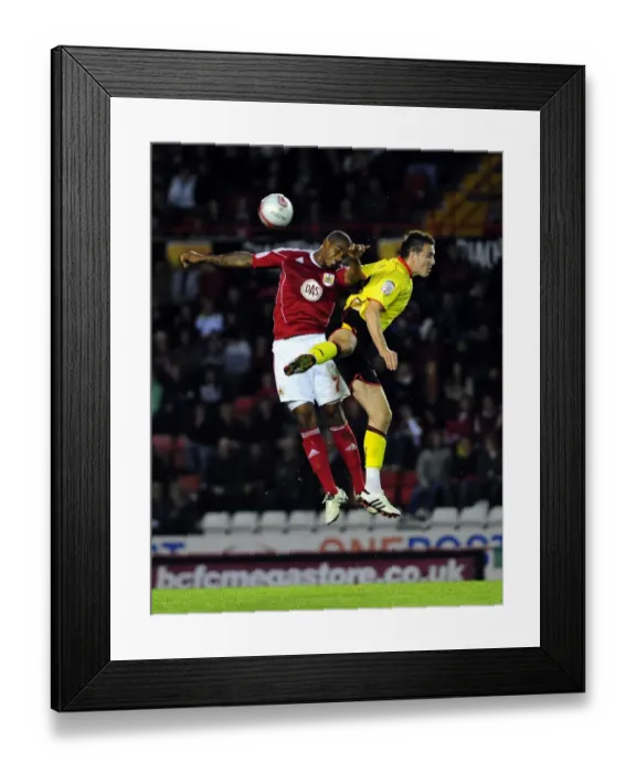 Framed Print : Bristol City vs Watford: Marvin Elliott vs Jordan Mutch - Aerial Battle in Championship Football, September 2010 Framed Print : Bristol City vs Watford: Marvin Elliott vs Jordan Mutch - Aerial Battle in Championship Football, September 2010
