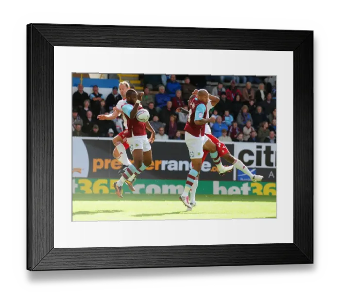 Framed Print : Burnley vs. Bristol City: Controversial Moment as Andre Bikey Handles the Ball Unnoticed by the Referee (Championship Football, 2010)