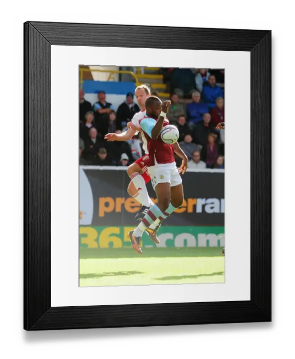 Framed Print : Controversial Moment: Andre Bikey's Unnoticed Handball in Burnley vs. Bristol City Championship Match, 2010