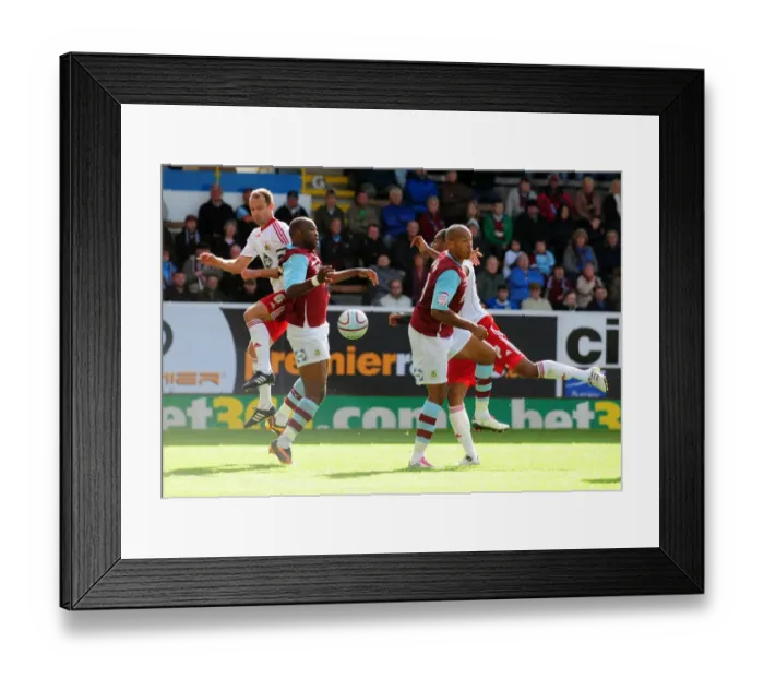 Framed Print : Controversial Moment: Burnley's Andre Bikey Sneakily Handles Ball in the Box Unnoticed by Referee during Burnley vs. Bristol City Championship Match (September 25, 2010) Framed Print : Controversial Moment: Burnley's Andre Bikey Sneakily Handles Ball in the Box Unnoticed by Referee during Burnley vs. Bristol City Championship Match (September 25, 2010)