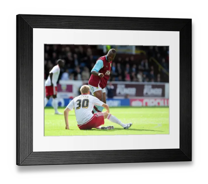 Framed Print : Burnley vs. Bristol City: Heated Moment Between Bikey and Stead in Championship Clash at Turf Moor (August 2010)