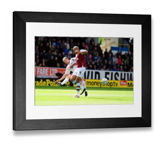Framed Print : Battling for Supremacy: Carey vs Iwelumo in the Championship Clash between Burnley and Bristol City Framed Print : Battling for Supremacy: Carey vs Iwelumo in the Championship Clash between Burnley and Bristol City
