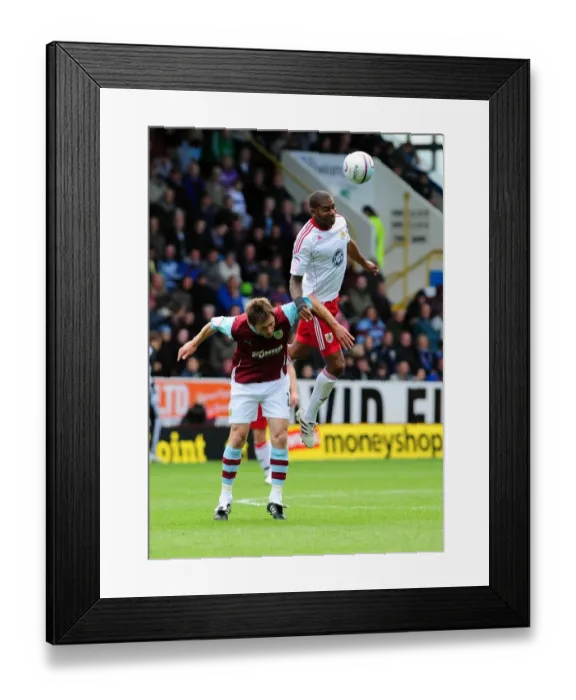 Framed Print : Clash at Turf Moor: Marvin Elliott vs. Wade Elliott - Burnley vs. Bristol City, Championship Football, 2010