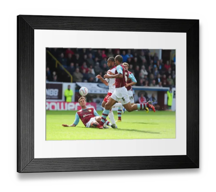 Framed Print : Battling for Supremacy: Haynes vs. Fox and Carlisle in Burnley vs. Bristol City Championship Clash, 2010 Framed Print : Battling for Supremacy: Haynes vs. Fox and Carlisle in Burnley vs. Bristol City Championship Clash, 2010