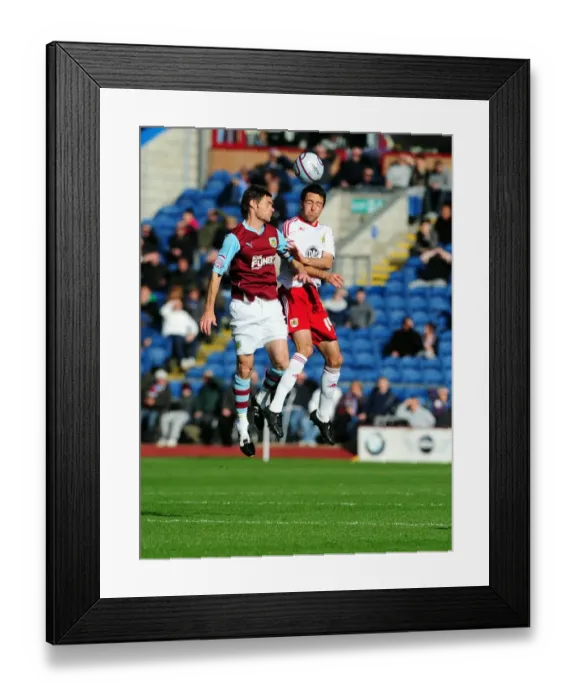 Framed Print : Clash at Turf Moor: Cole Skuse vs Graham Alexander - Burnley vs Bristol City, Championship Football, 2010 Framed Print : Clash at Turf Moor: Cole Skuse vs Graham Alexander - Burnley vs Bristol City, Championship Football, 2010