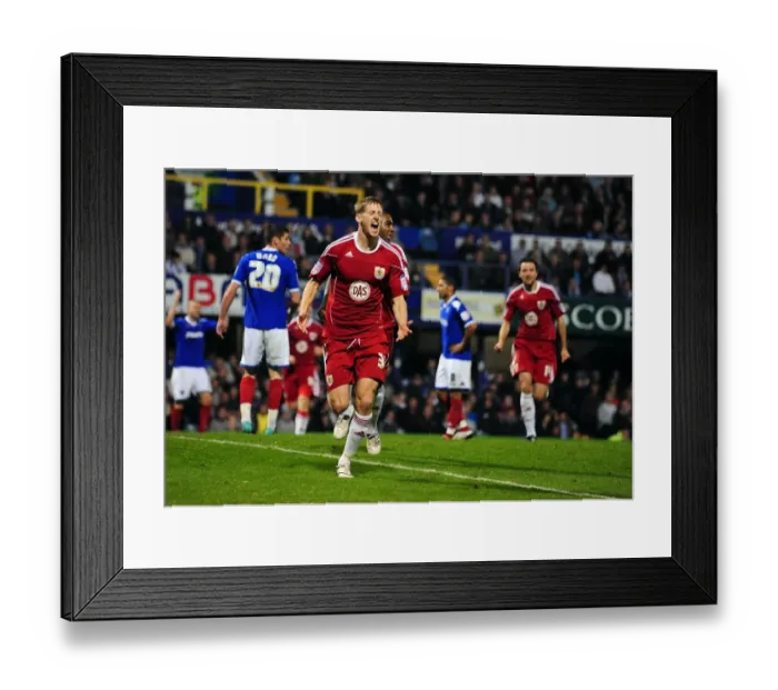 Framed Print : Jon Stead's Euphoric Goal Celebration: Portsmouth vs. Bristol City (Championship 2010)