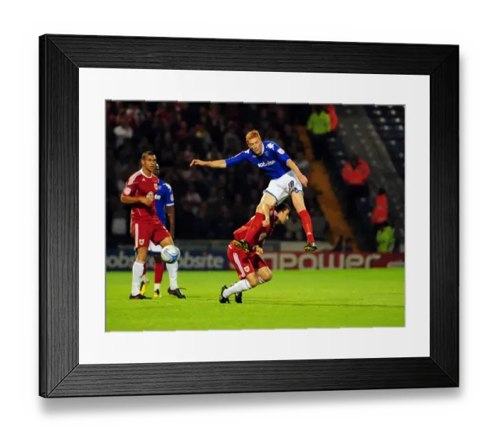 Framed Print : Clash at Fratton Park: Skuse vs. Kitson - Championship Showdown between Bristol City's Cole Skuse and Portsmouth's Dave Kitson, September 2010 Framed Print : Clash at Fratton Park: Skuse vs. Kitson - Championship Showdown between Bristol City's Cole Skuse and Portsmouth's Dave Kitson, September 2010