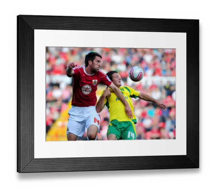 Framed Print : A Clash of Football Titans: Bristol City vs Norwich City - Season 10-11