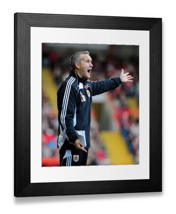 Framed Print : Bristol City FC: Keith Milen Leads the Charge Against Preston North End in Championship Clash at Ashton Gate Stadium (06 / 11 / 2010)