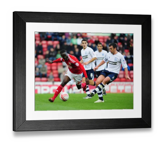 Framed Print : Adomah vs. Davidson: Intense Battle for the Ball in Bristol City vs. Preston North End Championship Match, 2010 Framed Print : Adomah vs. Davidson: Intense Battle for the Ball in Bristol City vs. Preston North End Championship Match, 2010