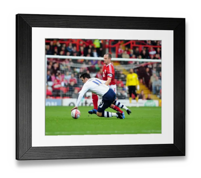Framed Print : Bristol City's Louis Carey Tackles Preston's Keith Treacy in Championship Clash at Ashton Gate Stadium (Bristol City v Preston North End, 06 / 11 / 2010)