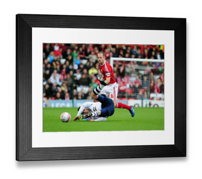 Framed Print : Bristol City's Louis Carey Tackles Keith Treacy in Intense Championship Clash at Ashton Gate Stadium (06 / 11 / 2010)
