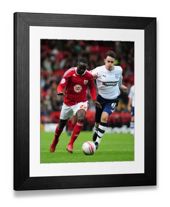 Framed Print : Adomah vs. Treacy: Intense Battle for Control in Bristol City vs. Preston North End Championship Clash, 2010 Framed Print : Adomah vs. Treacy: Intense Battle for Control in Bristol City vs. Preston North End Championship Clash, 2010