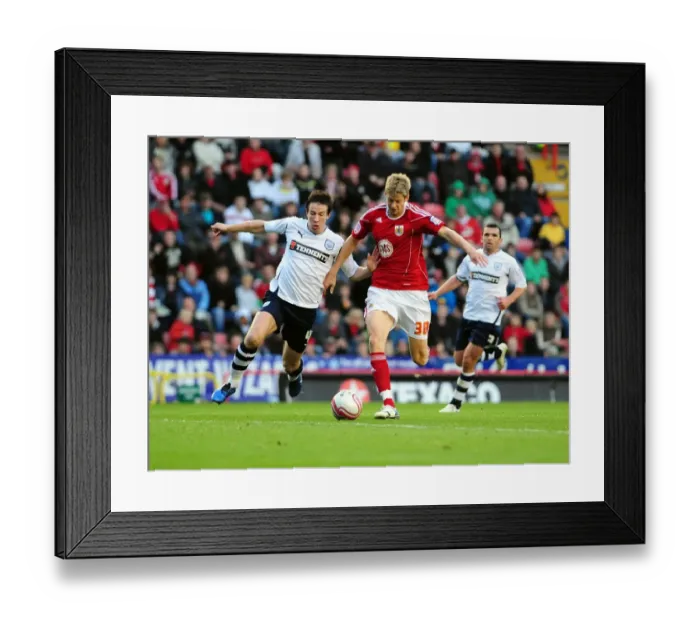 Framed Print : Battling for Supremacy: Jon Stead vs. Sean St. Ledger in the Championship Clash between Bristol City and Preston North End Framed Print : Battling for Supremacy: Jon Stead vs. Sean St. Ledger in the Championship Clash between Bristol City and Preston North End