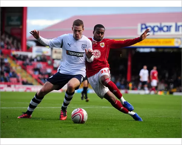 Battling for Supremacy: Danny Rose vs. Paul Coutts in the Championship Clash between Bristol City and Preston North End