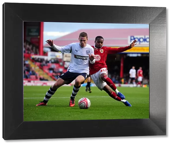 Battling for Supremacy: Danny Rose vs. Paul Coutts in the Championship Clash between Bristol City and Preston North End