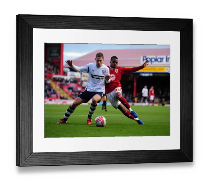Framed Print : Battling for Supremacy: Danny Rose vs. Paul Coutts in the Championship Clash between Bristol City and Preston North End