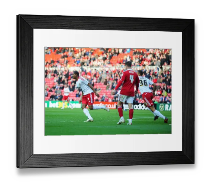 Framed Print : Bristol citys Marvin elliott celebrates with team mates after scoring the winning goal Framed Print : Bristol citys Marvin elliott celebrates with team mates after scoring the winning goal