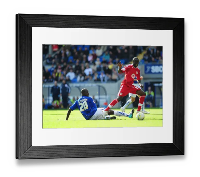 Framed Print : Clash of Titans: Olofinjana vs. Adomah in Intense Npower Championship Battle at Cardiff City Stadium (16 / 10 / 2010) Framed Print : Clash of Titans: Olofinjana vs. Adomah in Intense Npower Championship Battle at Cardiff City Stadium (16 / 10 / 2010)