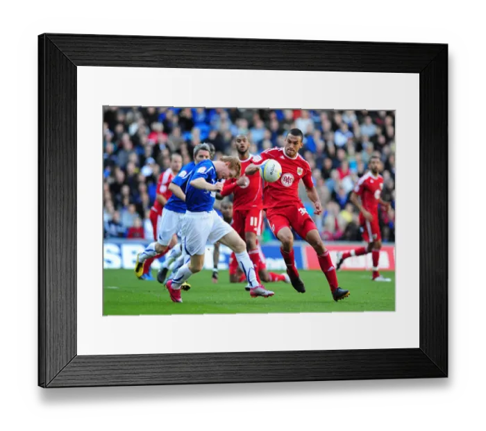 Framed Print : Intense Rivalry: Burke vs. Caulker in the Npower Championship Clash at Cardiff City Stadium (October 16, 2010) Framed Print : Intense Rivalry: Burke vs. Caulker in the Npower Championship Clash at Cardiff City Stadium (October 16, 2010)