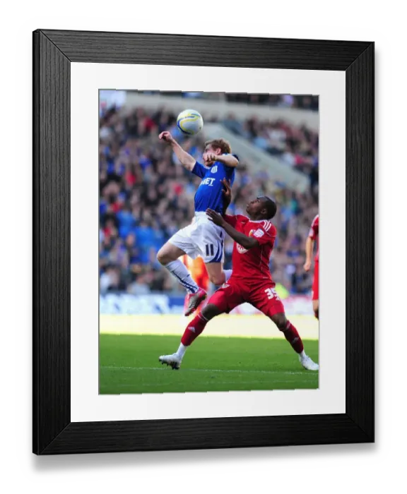 Framed Print : Intense Moment: Burke vs. Rose in Npower Championship Clash at Cardiff City Stadium (16 / 10 / 2010)