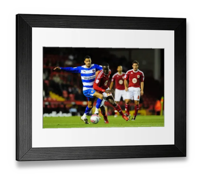 Framed Print : Adomah vs McAnuff: Intense Moment from the Npower Championship Clash between Bristol City and Reading, October 19, 2010 Framed Print : Adomah vs McAnuff: Intense Moment from the Npower Championship Clash between Bristol City and Reading, October 19, 2010