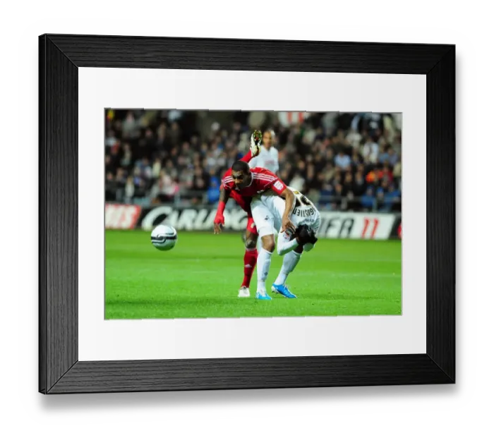 Framed Print : Battling for Championship Glory: Elliott vs. Agustien (10 / 11 / 2010) - Football Rivalry in the Championship: Swansea City vs. Bristol City Framed Print : Battling for Championship Glory: Elliott vs. Agustien (10 / 11 / 2010) - Football Rivalry in the Championship: Swansea City vs. Bristol City