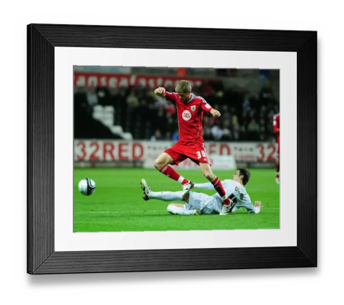 Framed Print : Intense Championship Showdown: Orlandi vs Stead at Swansea's Liberty Stadium (Swansea City vs Bristol City, 10 / 11 / 2010)