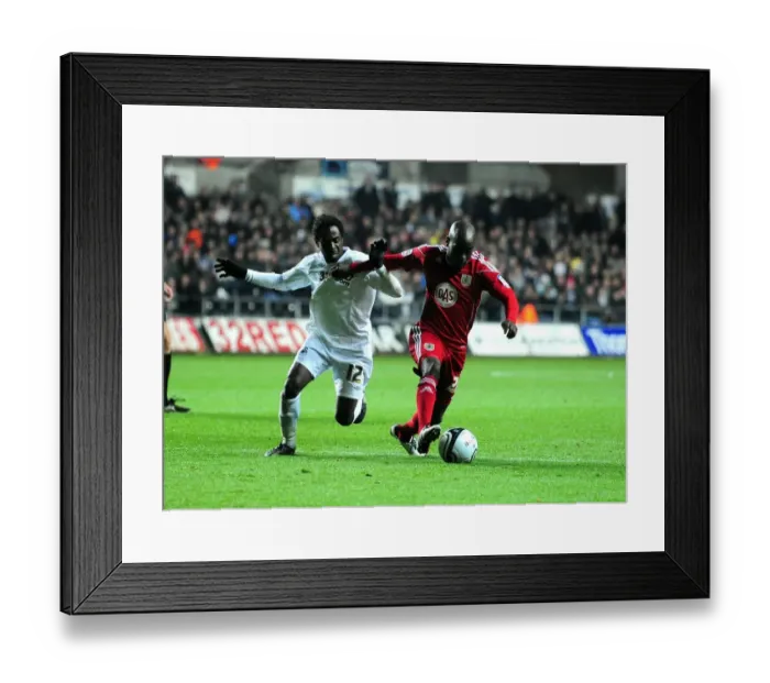 Framed Print : Battling for Supremacy: Jamal Campbell-Ryce vs. Nathan Dyer in Swansea City vs. Bristol City Championship Clash (10 / 11 / 2010) Framed Print : Battling for Supremacy: Jamal Campbell-Ryce vs. Nathan Dyer in Swansea City vs. Bristol City Championship Clash (10 / 11 / 2010)