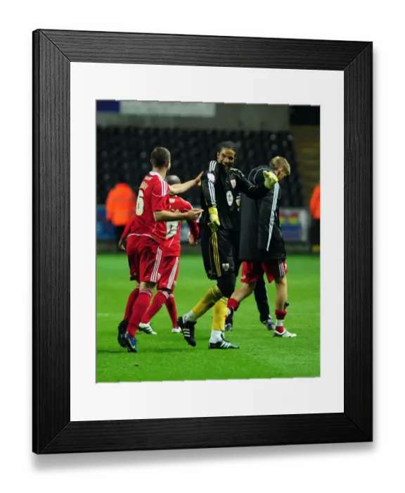 Framed Print : Championship Glory: David James and Louis Carey's Emotional Reunion after Bristol City's Victory over Swansea City (10 / 11 / 2010) Framed Print : Championship Glory: David James and Louis Carey's Emotional Reunion after Bristol City's Victory over Swansea City (10 / 11 / 2010)