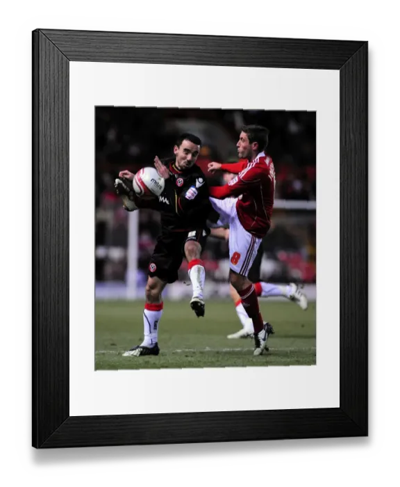 Framed Print : Battling for Supremacy: Lee Johnson vs. Leon Britton in the Championship Clash between Bristol City and Sheffield United (November 2010) Framed Print : Battling for Supremacy: Lee Johnson vs. Leon Britton in the Championship Clash between Bristol City and Sheffield United (November 2010)