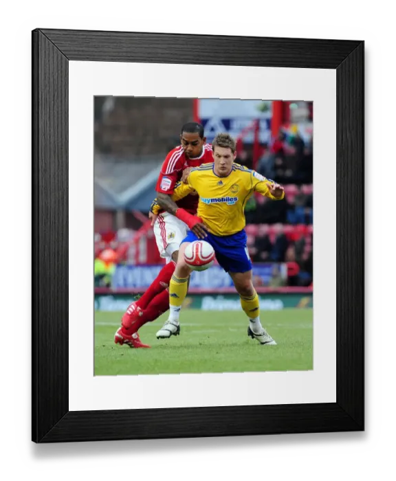 Framed Print : Battling for Championship Supremacy: Marvin Elliott vs. Kris Commons (11-12-2010)
