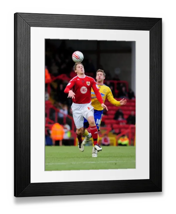 Framed Print : Bristol City vs Derby County: Christian Ribeiro vs Kris Commons Battle for Supremacy in the Championship (11-12-2010)