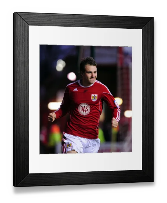 Framed Print : Brett Pitman's Euphoric Moment: The Championship-Winning Goal for Bristol City vs. Derby County (11-12-2010, Ashton Gate Stadium)