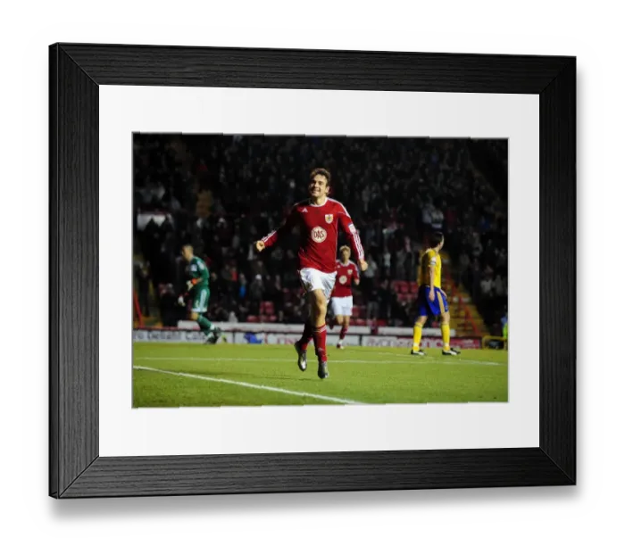 Framed Print : Euphoric Moment: Brett Pitman's Championship-Winning Goal for Bristol City vs. Derby County (11-12-2010, Ashton Gate Stadium) Framed Print : Euphoric Moment: Brett Pitman's Championship-Winning Goal for Bristol City vs. Derby County (11-12-2010, Ashton Gate Stadium)