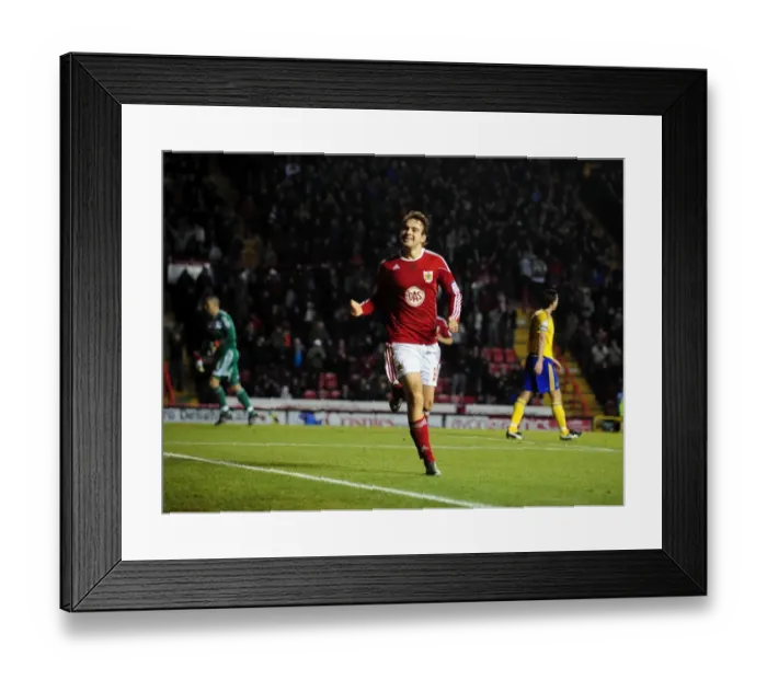 Framed Print : Brett Pitman's Euphoric Goal Celebration: Championship Match - Bristol City vs. Derby County (11-12-2010)