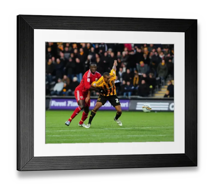 Framed Print : Battling for the Ball: Damion Stewart vs. Jay Simpson - 2010 Championship Clash between Hull City and Bristol City Framed Print : Battling for the Ball: Damion Stewart vs. Jay Simpson - 2010 Championship Clash between Hull City and Bristol City