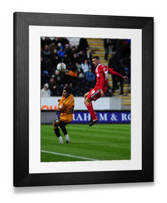 Framed Print : Bristol City's Steven Caulker Clears Ball in Championship Clash vs. Hull City (18 / 12 / 2010)