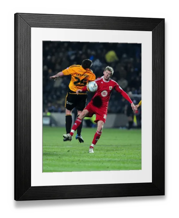 Framed Print : Battling for Championship Supremacy: Jon Stead vs. Anthony Gerrard (18 / 12 / 2010)