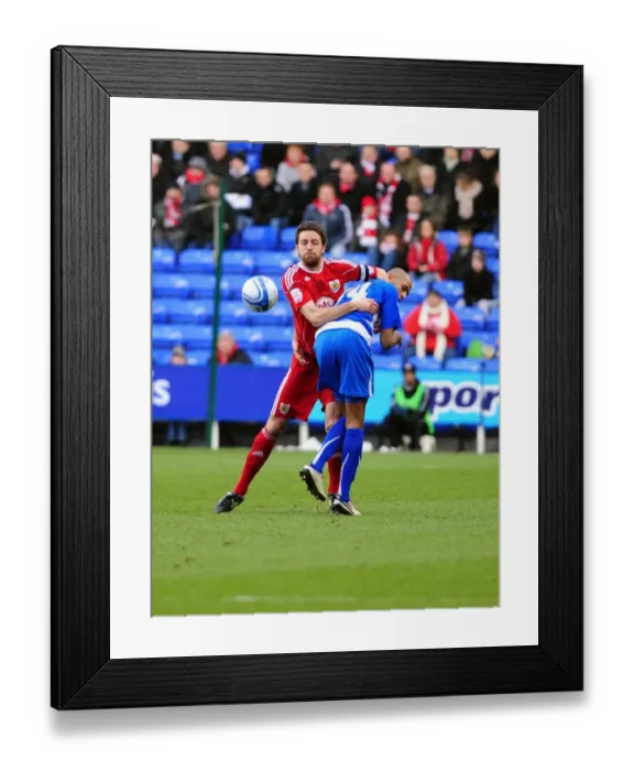 Framed Print : Battling for Supremacy: Cole Skuse vs. Jimmy Kebe in the 2010 Championship Clash between Reading and Bristol City Framed Print : Battling for Supremacy: Cole Skuse vs. Jimmy Kebe in the 2010 Championship Clash between Reading and Bristol City