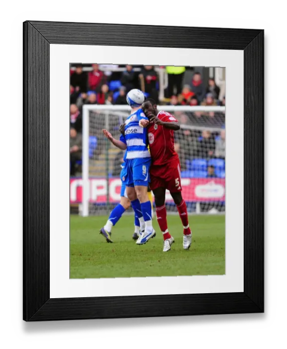 Framed Print : Bristol City's Damion Stewart Outjumps Shane Long in Championship Clash at Reading, 2010
