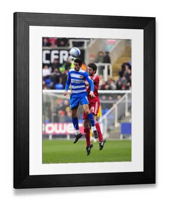 Framed Print : Battling for Control: Skuse vs. Karacan in the Intense Championship Clash between Reading and Bristol City (December 26, 2010) Framed Print : Battling for Control: Skuse vs. Karacan in the Intense Championship Clash between Reading and Bristol City (December 26, 2010)