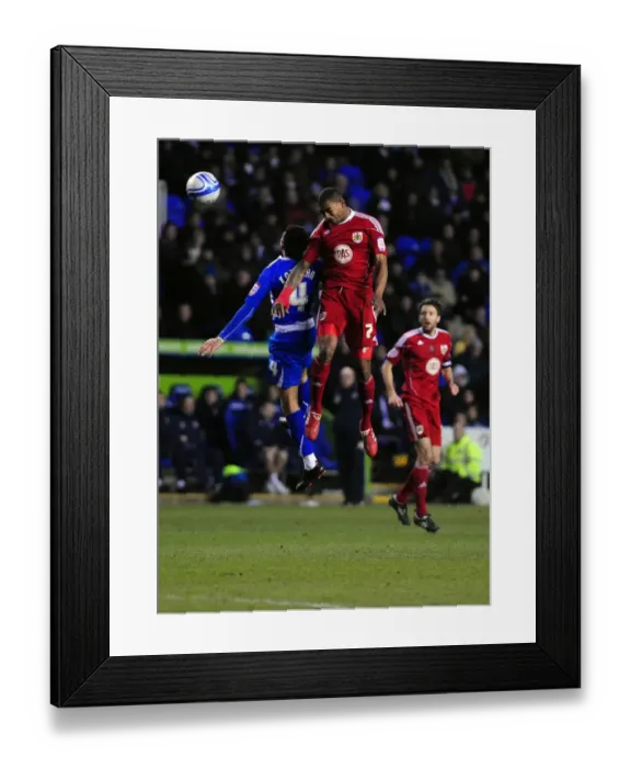Framed Print : Battling for Supremacy: Marvin Elliott vs. Jem Karacan in the Championship Clash between Reading and Bristol City (December 26, 2010) Framed Print : Battling for Supremacy: Marvin Elliott vs. Jem Karacan in the Championship Clash between Reading and Bristol City (December 26, 2010)