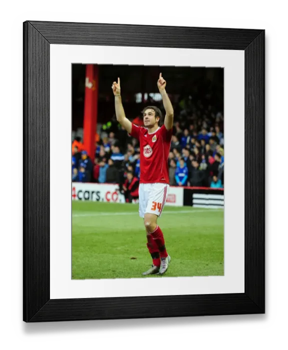 Framed Print : Brett Pitman's Euphoric Goal Celebration: Bristol City vs. Cardiff City (Championship, 01 / 01 / 2011)