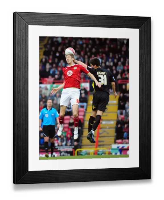 Framed Print : Battling for Supremacy: Jon Stead vs. Chris Riggott in the 2011 Championship Clash between Bristol City and Cardiff City Framed Print : Battling for Supremacy: Jon Stead vs. Chris Riggott in the 2011 Championship Clash between Bristol City and Cardiff City
