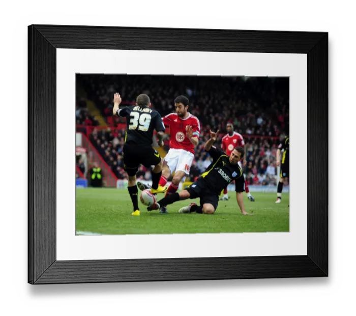 Framed Print : Battling for Supremacy: Skuse vs Bellamy & Chopra in the Bristol City vs Cardiff City Championship Clash, 01 / 01 / 2011 Framed Print : Battling for Supremacy: Skuse vs Bellamy & Chopra in the Bristol City vs Cardiff City Championship Clash, 01 / 01 / 2011