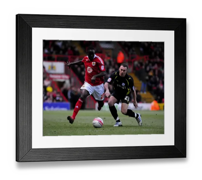 Framed Print : Adomah vs Blake: Intense Battle for Control in the 2011 Championship Clash between Bristol City and Cardiff City Framed Print : Adomah vs Blake: Intense Battle for Control in the 2011 Championship Clash between Bristol City and Cardiff City