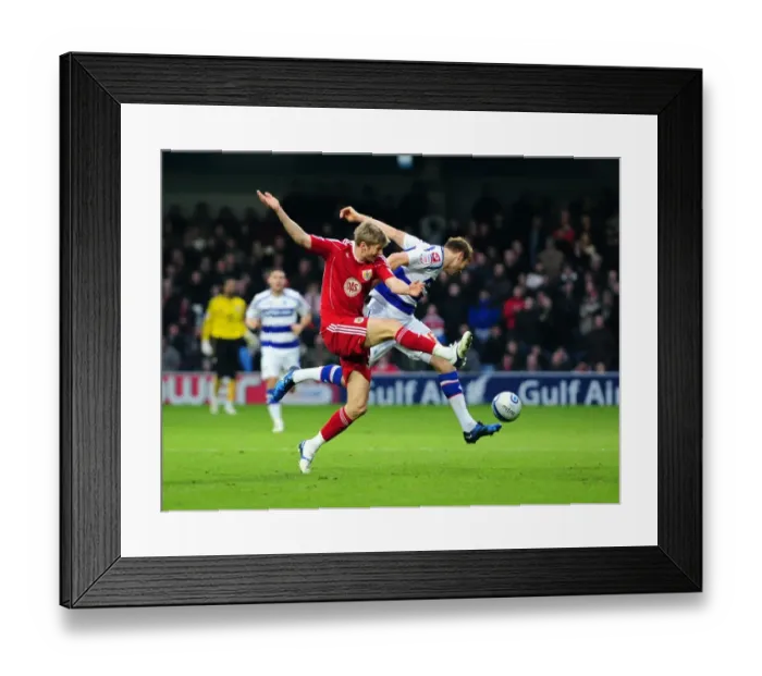 Framed Print : Bristol City's Jon Stead Fouled by QPR's Kaspars Gorkss in Championship Match Framed Print : Bristol City's Jon Stead Fouled by QPR's Kaspars Gorkss in Championship Match