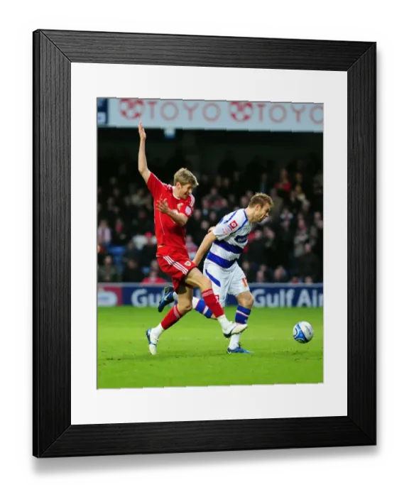 Framed Print : Bristol City's Jon Stead Foul by QPR's Kaspars Gorkss in Championship Match Framed Print : Bristol City's Jon Stead Foul by QPR's Kaspars Gorkss in Championship Match