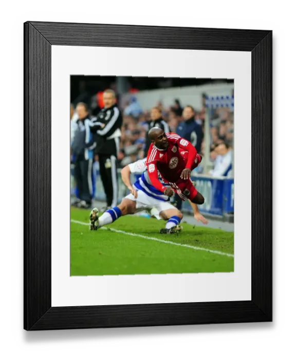Framed Print : Jamal Campbell-Ryce Fouled by Bradley Orr in QPR vs. Bristol City Championship Match (03 / 01 / 2011)